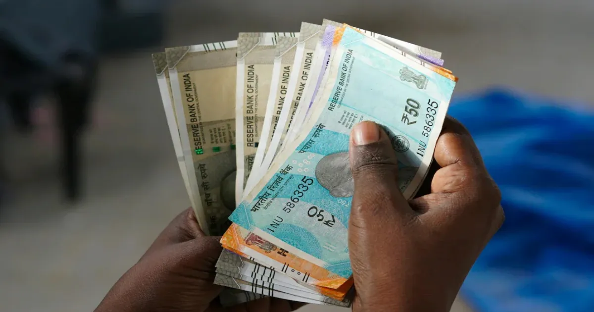 Rupee Weakens To 93.39 Against US Dollar As Oil Prices And Capital Outflows Rise