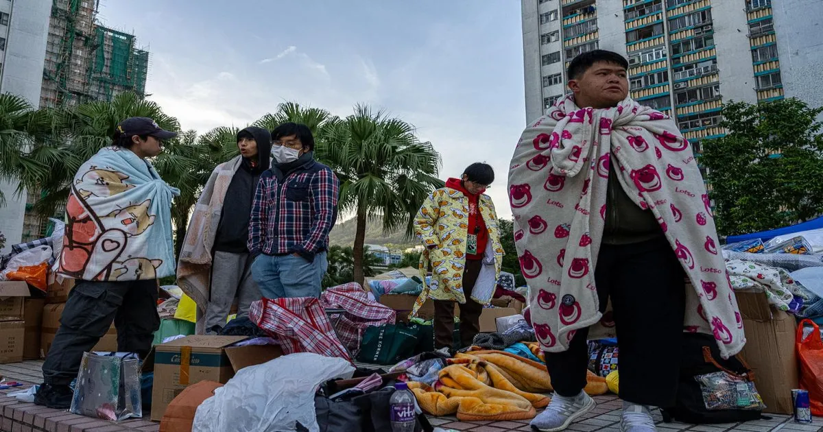 Survivors Return To Fire-Damaged Homes In Hong Kong Five Months After Blaze