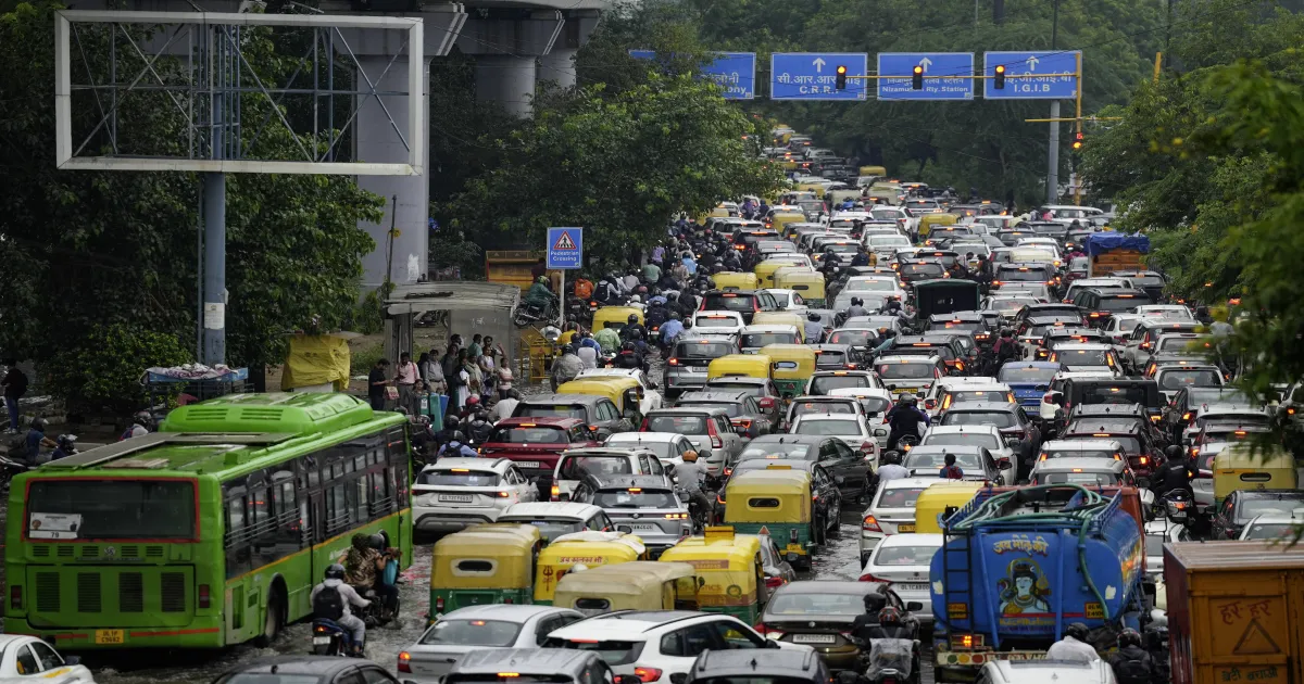 Delhi’s Roads Paralyzed by Rain-Induced Traffic 