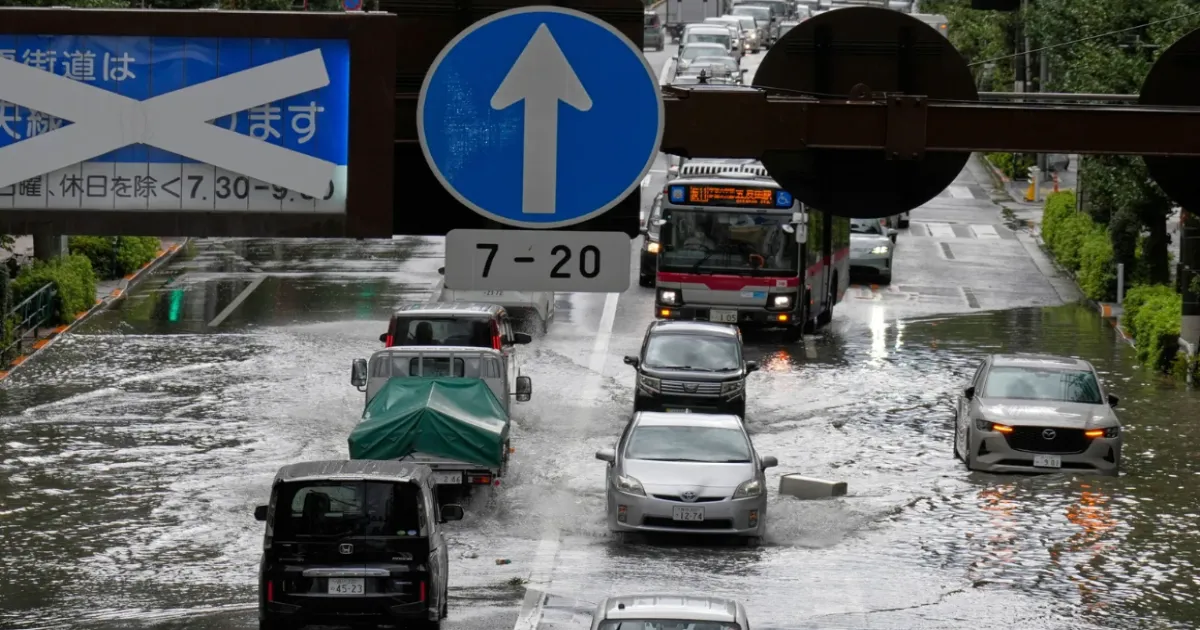 Sudden Heavy Rain Floods Tokyo Streets, Disrupts Air And Rail Traffic