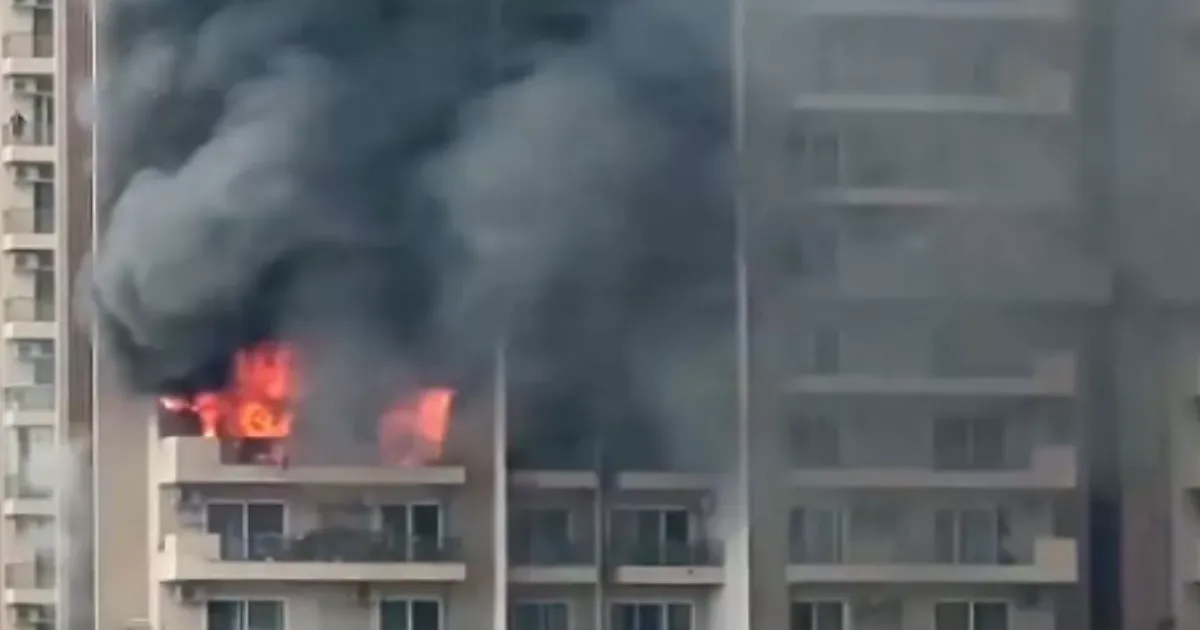 Noida High-Rise Fire Contained; AC Blast Suspected as Six Tenders Battle 21st Floor Blaze