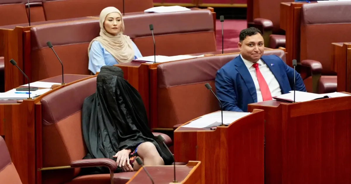 Australian Senator Pauline Hanson Suspended for Wearing Burqa in Parliament Protest