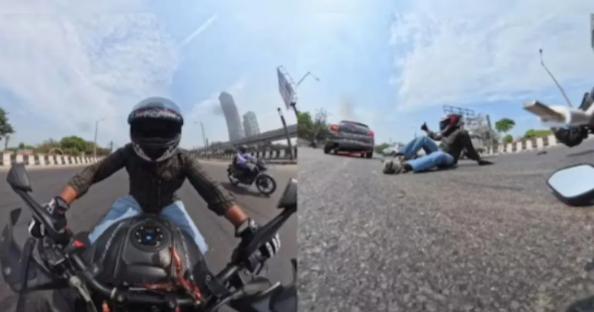 Indian Biker Survives High-Speed Crash Unhurt, Signals Thumbs-Up to Car Driver
