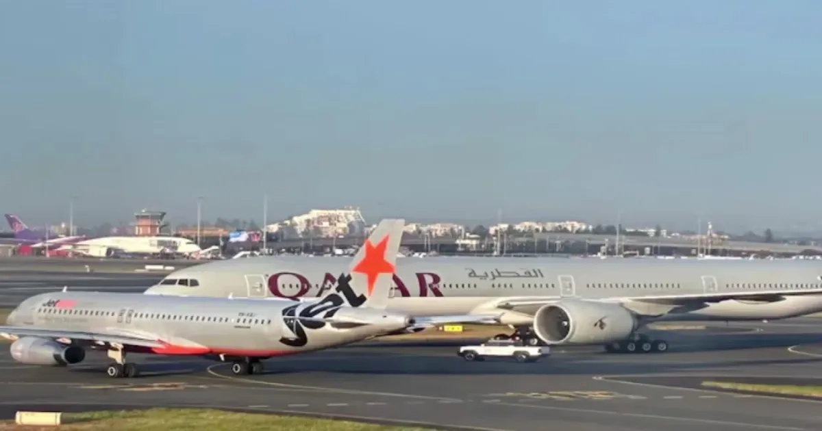 Sydney Airport Near Miss Injures Crew Member; Authorities Investigate Incident