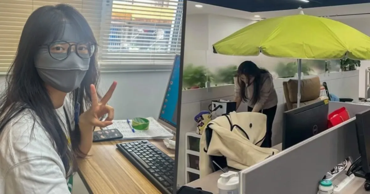 Chinese Office Workers Use Parasols And Sunscreen Amid 'Office Ageing' Concerns